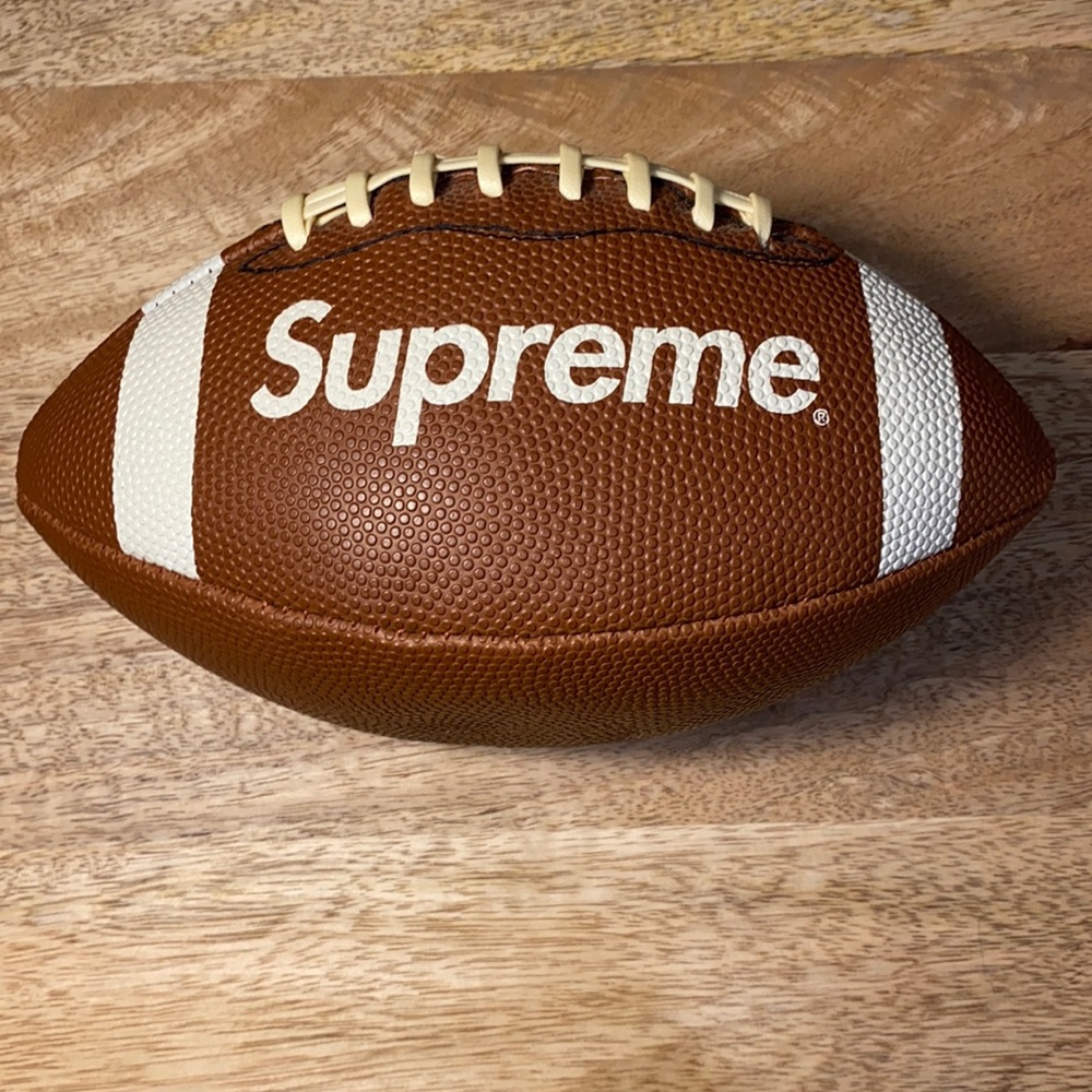 Brand new Supreme x Wilson mini football, with original Wilson tag.